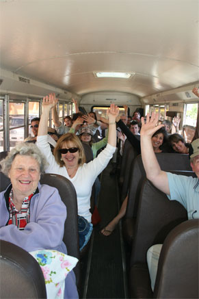 With arms in the air, guests ride the shuttles up from Mill Valley