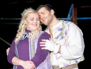 Guenevere (Krista Joy Serpa) and Sir Lancelot (Izaak Heath) embracing